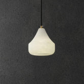 Alabaster Hat Pendant Light Over Nightstand